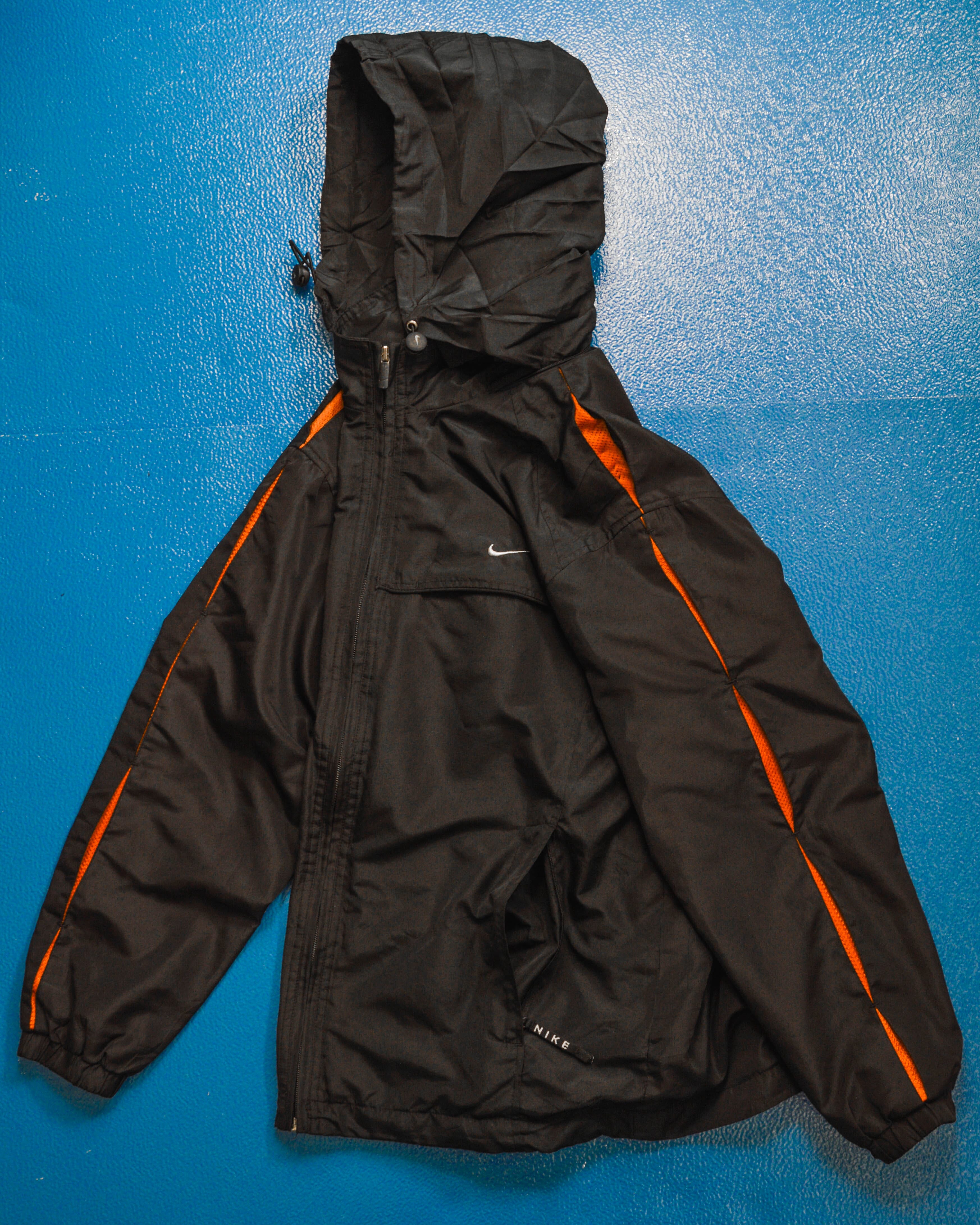 Black and hotsell orange nike windbreaker